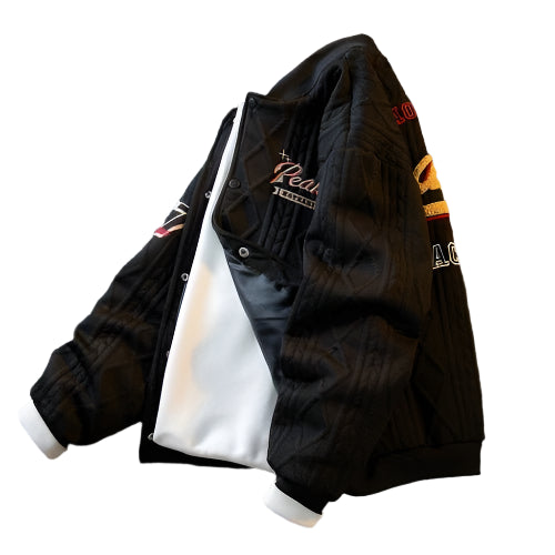 White cable-knit varsity jacket for kids – soft, warm, and stylish outerwear with ribbed cuffs and embroidered patches