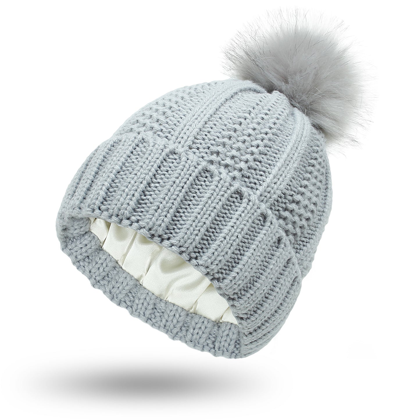 Women's satin-lined knit beanie with faux fur pom – Cozy and stylish winter hat.