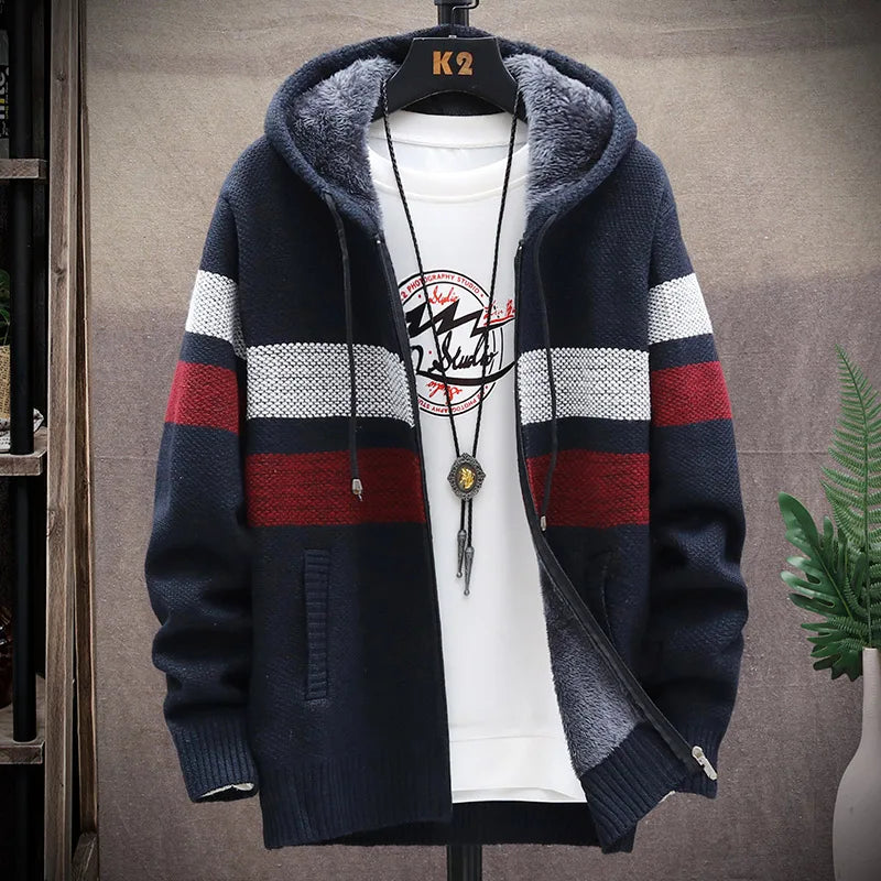 Navy blue, red, and white striped hoodie on a mannequin against a neutral background