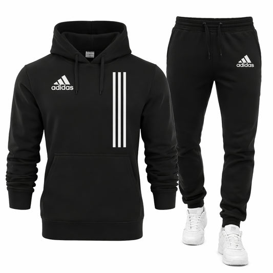 Black Adidas hoodie and pants set with white stripes on a white background