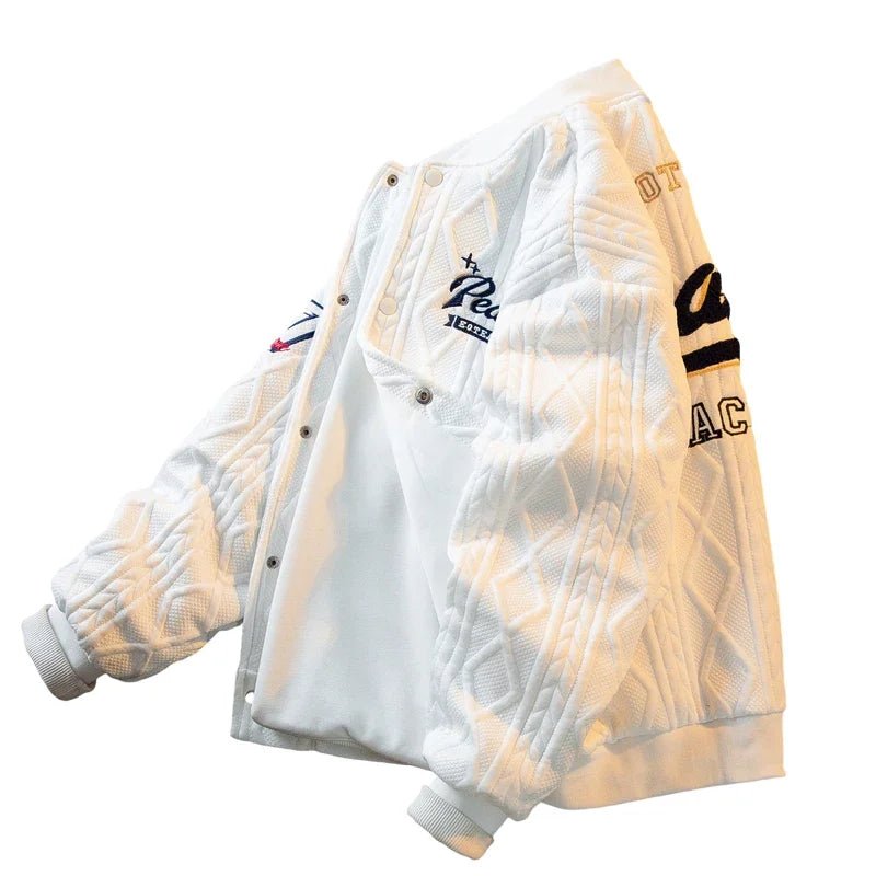 White cable-knit varsity jacket for kids – soft, warm, and stylish outerwear with ribbed cuffs and embroidered patches