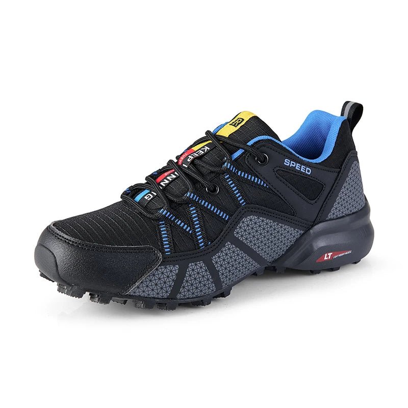 Black and gray athletic shoe with blue accents on a white background